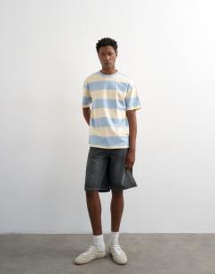 Model wearing Relaxed fit t-shirt with wide stripe in blue and cream 