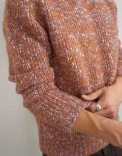 Model wearing Relaxed fit textured knitted crew neck jumper in mauve