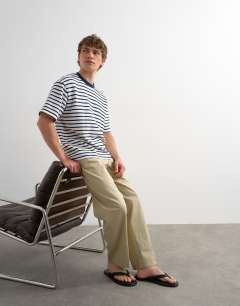 Model wearing Relaxed fit textured t-shirt with breton stripe in navy