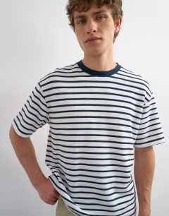 Model wearing Relaxed fit textured t-shirt with breton stripe in navy