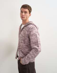 Model wearing Relaxed fit textured zip through knitted hoodie in pink