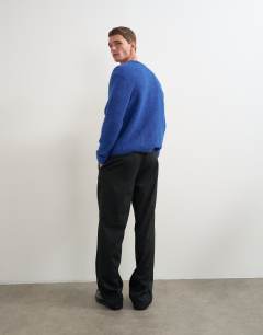 Model wearing Relaxed fit tuxedo trouser in black