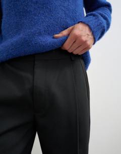 Model wearing Relaxed fit tuxedo trouser in black