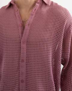 Model wearing Relaxed fit woven mesh shirt in washed pink