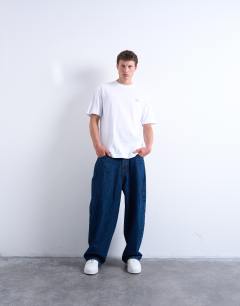 Model wearing Relaxed for Going Nowhere print t-shirt in white