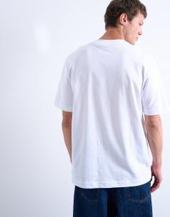 Model wearing Relaxed for Going Nowhere print t-shirt in white