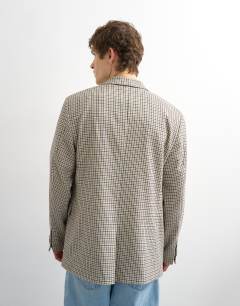 Model wearing Relaxed gingham check blazer in multi