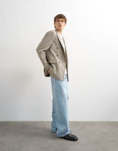 Model wearing Relaxed gingham check blazer in multi