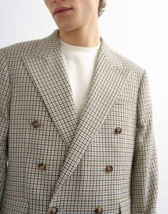 Model wearing Relaxed gingham check blazer in multi