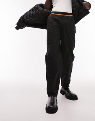 Topman loose nylon elasticated waist with orange highlight trousers in black