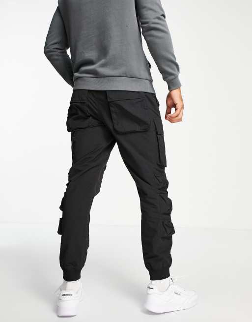 Topman relaxed nylon multi pocket cargo pants in black | ASOS