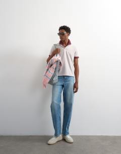 Model wearing Relaxed short sleeve pique polo in light grey