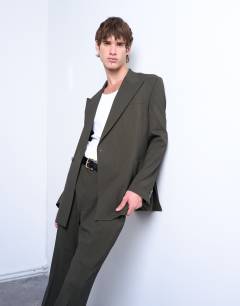 Model wearing Relaxed wool touch suit jacket in green