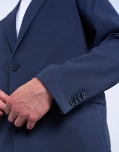 Model wearing Relaxed wool touch suit jacket in navy