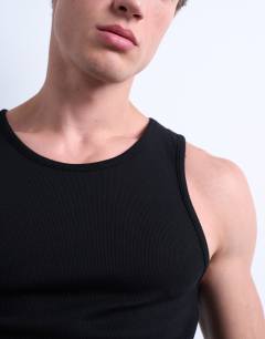 Model wearing Rib vest in black