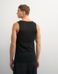 Model wearing Rib vest in black