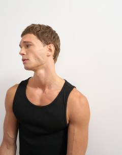 Model wearing Rib vest in black