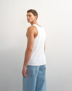 Model wearing Rib vest in white