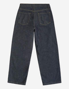 Model wearing Rigid baggy fit jean in raw