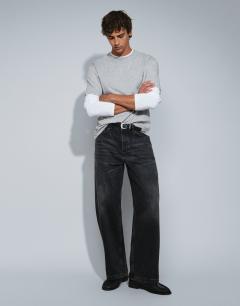 Model wearing Rigid baggy fit jean in washed black