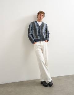 Model wearing Rigid baggy fit jean in white