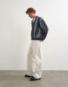 Model wearing Rigid baggy fit jean in white