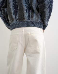 Model wearing Rigid baggy fit jean in white