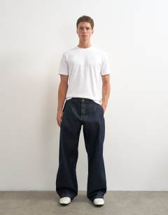 Rigid baggy fit jean with pleats in raw