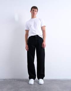 Model wearing Rigid baggy jean in black