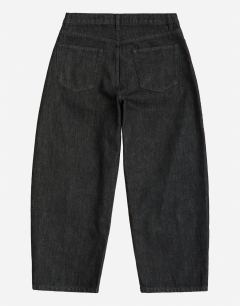 Model wearing Rigid barrel fit jean in raw black