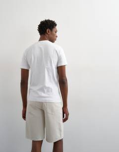 Model wearing Rigid denim short in bone
