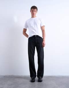 Model wearing Rigid flare jean in washed black