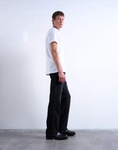 Model wearing Rigid flare jean in washed black