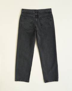 Model wearing Rigid straight fit jean in clean washed black