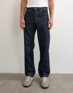 Model wearing Rigid straight fit jean in raw