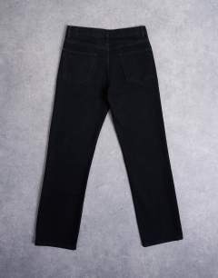 Model wearing Rigid straight jean in black