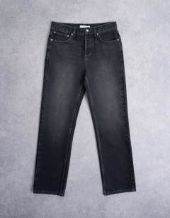Model wearing Rigid straight jean in washed black