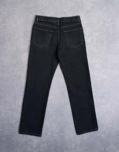 Model wearing Rigid straight jean in washed black