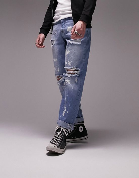 https://images.asos-media.com/products/topman-rip-and-bleach-relaxed-jeans-in-mid-wash/201805551-1-midwashblue?$n_550w$&wid=550&fit=constrain