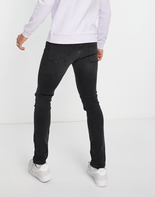 Topman rip 'n repair stretch skinny jeans in washed black 