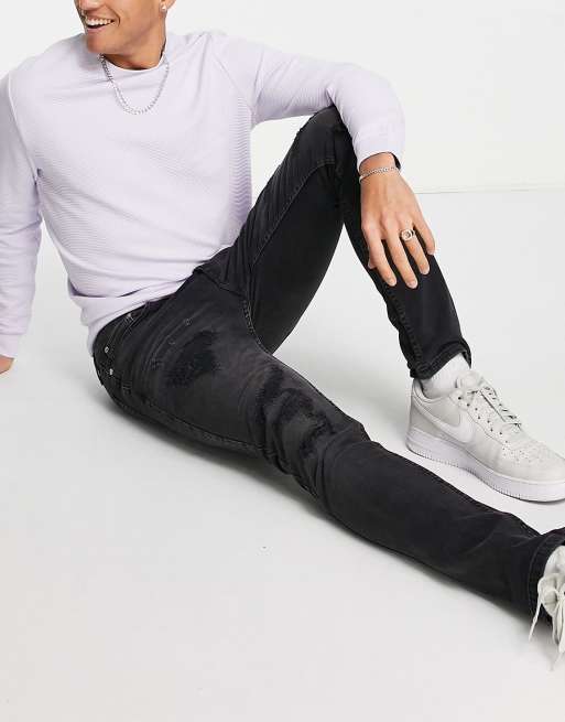 Topman rip 'n repair stretch skinny jeans in washed black 