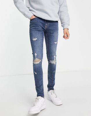 Topman rip spray on jeans in mid wash