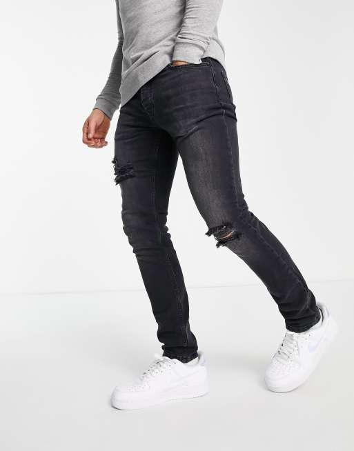 Topman rip stretch skinny jeans in washed black ASOS