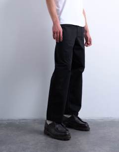 Model wearing Ripstop taper leg trouser with seam detail in black