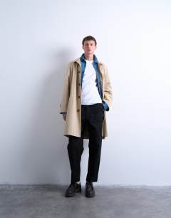 Model wearing Ripstop taper leg trouser with seam detail in black