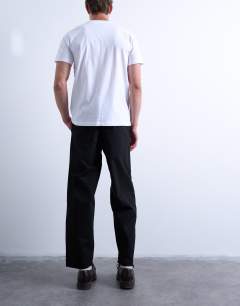 Model wearing Ripstop taper leg trouser with seam detail in black