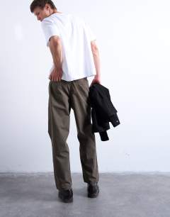 Model wearing Ripstop taper leg trouser with seam detail in khaki