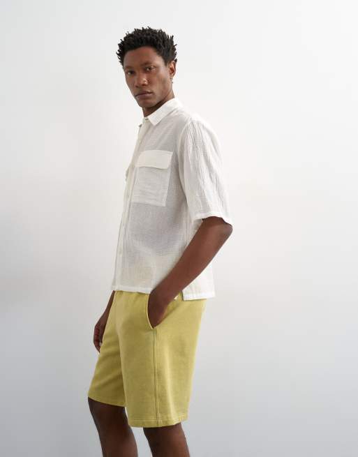 Topman - Ruimvallende bermuda joggingshort in geel met wassing, 4 van 5
