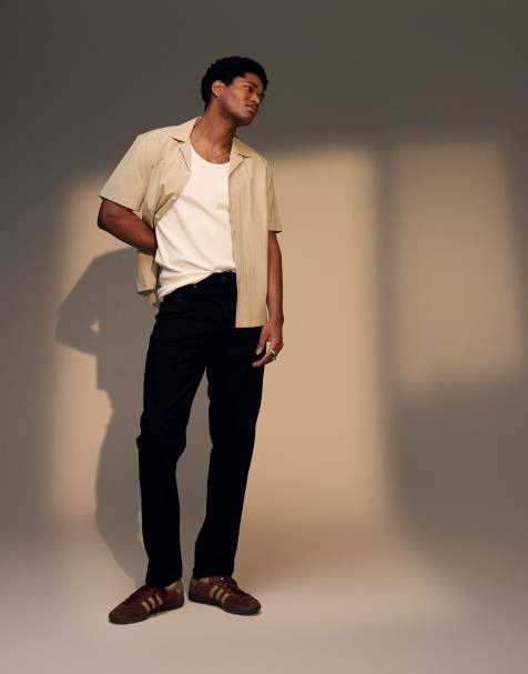 Topman – Schmal zulaufende, feste Jeans in Schwarz - view 1