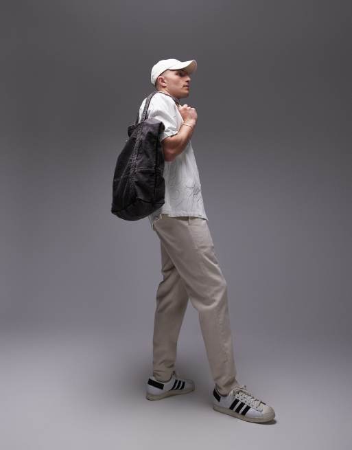 Topman – Schmal zulaufende Hose in Ecru mit elastischem Bund